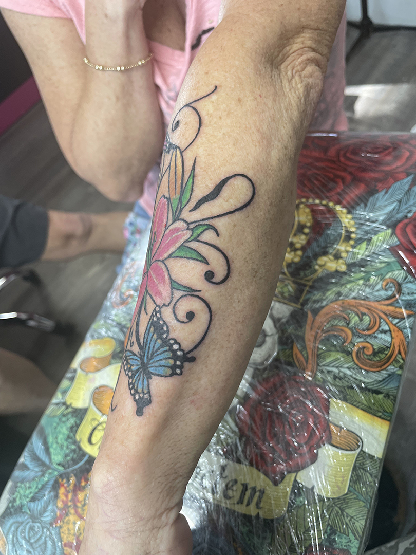 Butterfly lotus tattoo
